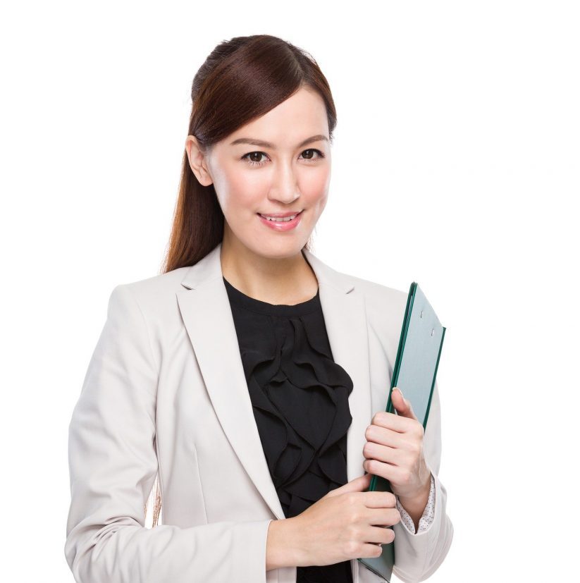 Business woman holding clipboard