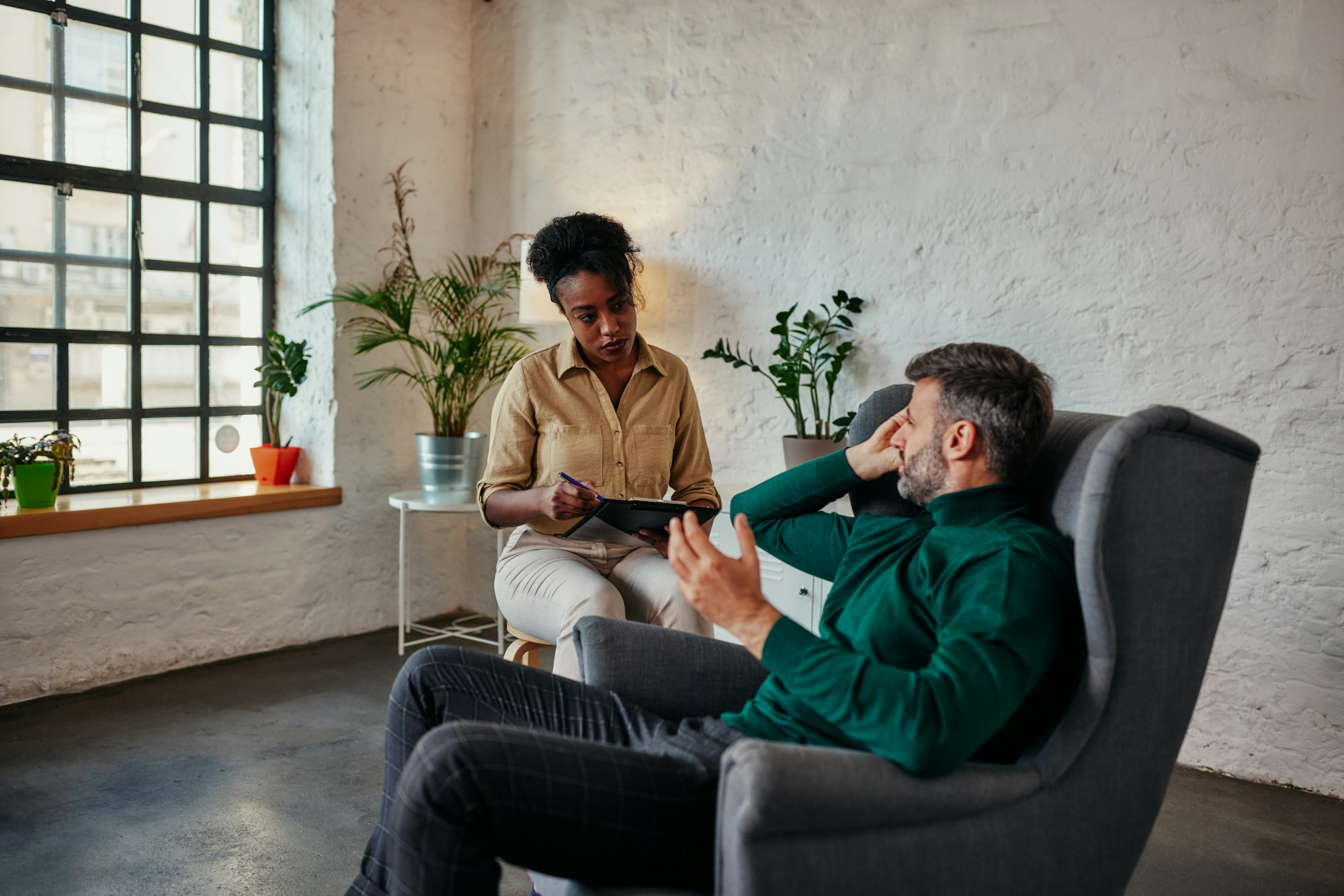 Man discusses issues with therapist